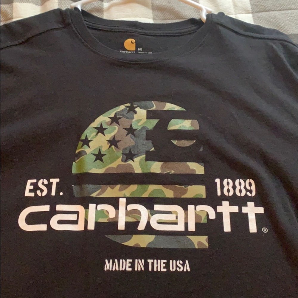 Black Carhartt long sleeve. Camo logo.